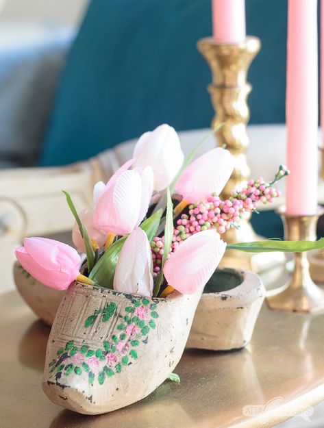 They might not feel very comfy on your feet, but there are lots of different ways you can use Dutch wooden shoes in your decorating. They make great planters, flower vases and organizers for all sorts of things, as you'll see in this roundup of repurposed klompen wood clogs. #netherlands #holland #woodenshoes #springdecorating #tulips Dutch Wooden Shoes, Wooden Clogs, Spring Party, Spring Holidays, Vintage Spring, Wooden Shoes, Fresh Flower, Colorful Party, Spring Home