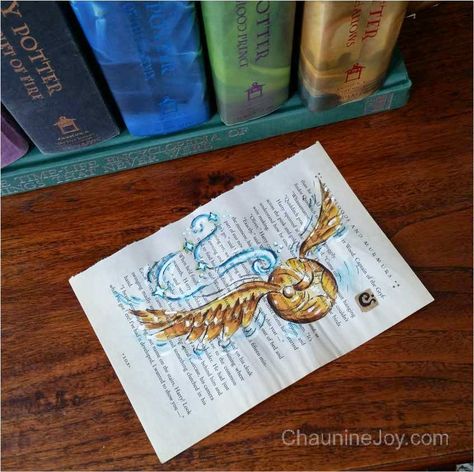 The Golden Snitch - Painted on a book page from Harry Potter and the Chamber of Secrets by Artist, Chaunine Joy Golden Snitch Tattoo, Snitch Tattoo, The Golden Snitch, Hp Tattoo, Harry Potter Golden Snitch, Harry Potter Painting, The Chamber Of Secrets, Harry Potter And The Chamber Of Secrets, Golden Snitch