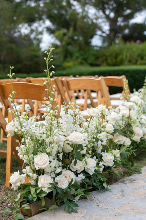 These beautiful green and white aisle flowers were the perfect addition to this stunning La Venta Inn wedding in Palos Verdes. Photographer: Jenna Rose Photo | Florist: Little Hill Floral Designs White Rose Isle Wedding, Rose Lined Aisle, White Aisle Flowers, Ceremony Aisle Flowers, Church Aisle, Ceremony Aisle, Aisle Runner Wedding, Aisle Flowers, White Wedding Theme