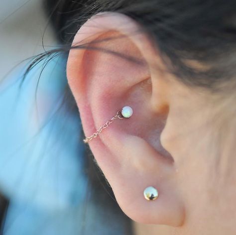 Ryan Dreyfuss | Body Piercer on Instagram: “Chain Gang! 🌟 Healed Conch piercing upgraded to a claw-set “fauxpal” from @peoples_jewelry and a Rose Gold Chain from @jewelrythisway” High Conch Piercing, Chain Conch Piercing, Chain Gang, Cool Ear Piercings, Sun Tattoos, Conch Piercing, Rose Gold Chain, Ear Piercing, A Rose