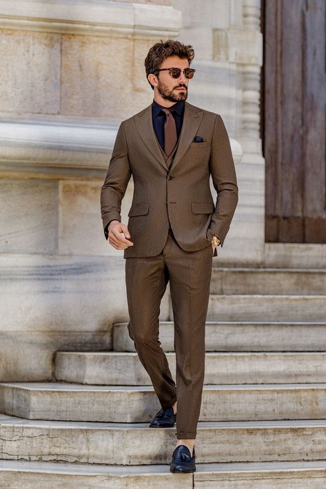 Step into timeless elegance with the Brown Slim-Fit Suit 3-Piece. Its sleek fit and rich brown tone bring out an understated charisma that complements both professional and formal events with ease.

#brownslimfitsuit #elegantmenswear #classylook #formalfashion #modernfit #tailoredsuit #professionalstyle #sharpdressing #businessattire #menssuit 3 Button Suit Men, Brown Suit Black Shirt, Brown Suit Outfit Men, Brown Blazer Outfit Men, Brown Mens Suit, Brown Blazer Men, Brown Suit Wedding, Brown Suits For Men, Blue Blazers