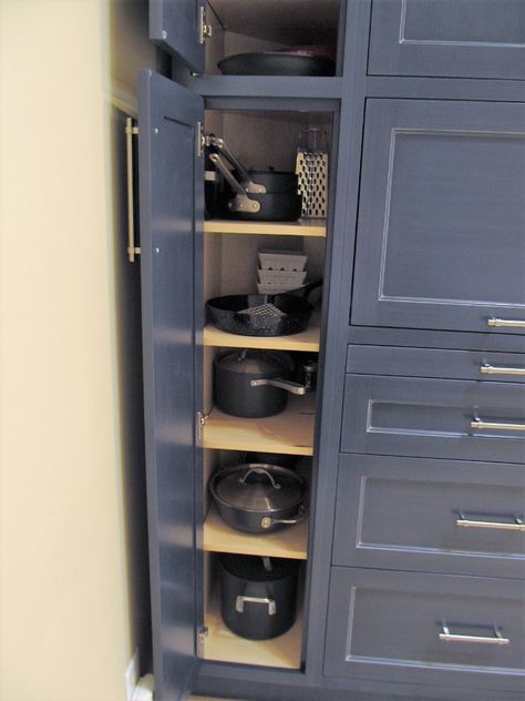 Side cabinet for pots and pans - a funny angled wall in the back made this the perfect use Pan Cabinet Storage, Pot And Pan Cabinet, Cabinet For Pots And Pans, Pots And Pans Cabinet, Slim Kitchen Cabinet, Angled Wall, Appliance Cabinet, Pan Storage, Small Kitchen Cabinets