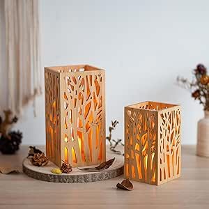 Want to add some unique flair to your living room or garden? The Romadedi Pillar Candle Holder Bamboo Japanese Decor is just what you need! This set of 2 hurricane lantern-style wood candle holders is perfect for a boho, cabin, or farmhouse aesthetic. They make an elegant table centerpiece or a charming addition to any space.#LivingRoomIdeas #MinimalistLivingRoom #BohoLivingRoomDecor Boho Cabin, Elegant Table Centerpieces, Japanese Candles, Cabin Farmhouse, Living Room Garden, Japanese Lanterns, Lantern Candle Decor, Pillar Candle Holder, Japanese Decor