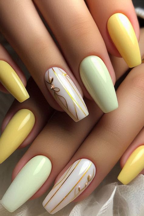 Discover the elegance of our pastel yellow, green, and white nail art, beautifully adorned with delicate gold accents. Perfect for adding a touch of glamour to your summer look! 💅💚✨ #NailArt #PastelNails #SummerStyle Pastel Yellow And Green Nails, Green And White Nail Art, Easy Summer Nails, Nail Parlour, Bday Nails, New Year Nails, Usa Nails, Yellow Nail Art, Yellow Nails Design