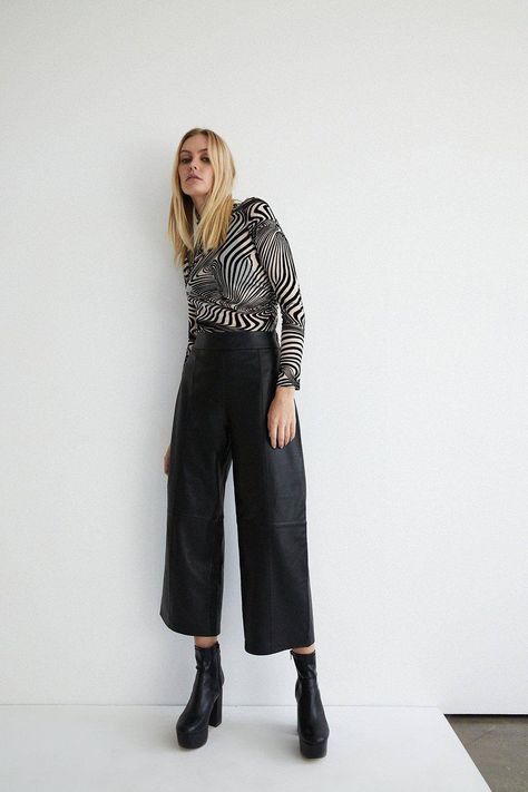 The 25 Best Wide-Leg Leather Trousers For Autumn | Who What Wear UK Leather Trousers Outfit, Linen Culottes, Trousers Outfit, Autumn Winter 2022, Cotton Midi Skirt, Beige Coat, Wide Trousers, Chunky Knitwear, Leather Trousers