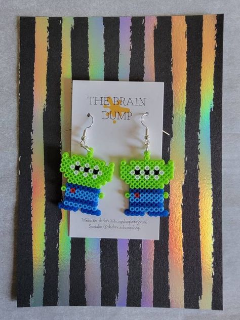 The Clawwww! Martian Mini Perler Beads Dangle Earrings - Hama Beads - Fun & Cute Jewelry - Nostalgic - Funny Accessories - Alien Toy Story Inspired Earrings - Artkal - Throwback  Hypoallergenic & Nickel Free! Melty Bead Earrings, Mini Perler Beads Ideas, Tiny Perler Bead Patterns, Perler Bead Jewelry, Alien Perler, Mini Perler Bead Patterns, Rave Perler Pattern, Hama Beads Jewelry, Mini Perler Beads