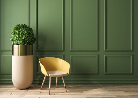 We love this olive green color choice for an accent wall! #Green #Accentwall Green Wall Molding, Green Wall Moulding, Dnevna Soba Ideje, Olive Green Accent Wall, Green Living Room Paint Colors, Playroom Den, Green Painted Walls, Olive Green Walls, Wall Green