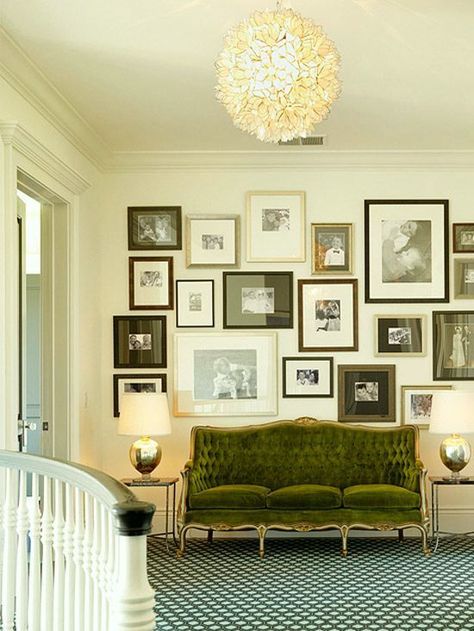 kenfulkCounty_Classic-6-295 Family Photo Gallery Wall, Ken Fulk, Family Photo Wall, Symbol Art, Green Couch, Photo Wall Gallery, Green Sofa, Green Home Decor, Vintage Sofa