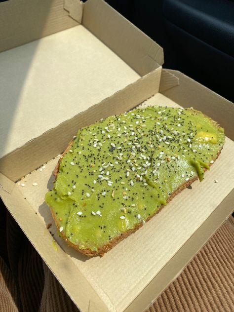 An avocado toast with seeds on top, in a carton box and the box is over pants that are two different shades of brown Donut Aesthetic, Dunkin Donut, Avocado Toast, Pretty Pictures, Donuts, Avocado, Toast