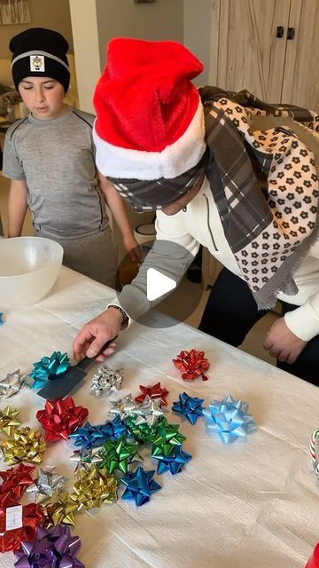 Snejana Andreeva on Instagram: "🤶The Modern Nonna’s Christmas Olympics GAME 3 (check previous reels for games 1 and 2)🤶 Happy Boxing Day! I wanted to share our Christmas family tradition and the Holiday games that I set up for my family! The third game that we played on Christmas is called “BOW SHOVEL” and the goal is to get as many bows as possible with a spatula blindfolded into a bowl (IN ONE MINUTE) The winner of the game gets a prize 🏆 Tag anyone that would love this ❤️ Love you! Hope you enjoyed watching these games 🎁 Merry Christmas again from my family, to yours! ⠀⠀⠀⠀⠀⠀⠀⠀⠀⠀⠀⠀ #christmas #christmasgames" Festive Christmas Bow Family Game, Door Prize Games Christmas, Bow Spatula Game, Holiday Family Games With Prizes, Christmas Games With Gift Bows, Christmas Pijamada Ideas, Christmas Bow Game With Spatula, Bow Spatula Christmas Game, Minute Ti Win It Christmas Games