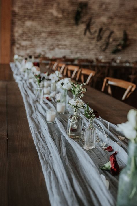 Farm Table With Runner Wedding, Cheesecloth Table Runner With Candles, Wedding Table Decorations Cheesecloth, Simple Wedding Table Decor Without Plates, Simple Table Runner Wedding, Cheesecloth Runner Bud Vases, No Tablecloth Wedding Tables, Cheesecloth Centerpiece Wedding Round Table, Simple Wedding Table Settings Rectangle