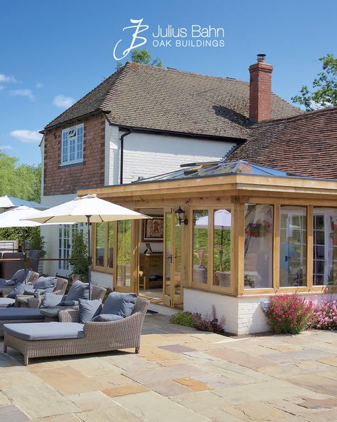 A delightful alternative to a standard brick-built extension, this traditional oak-framed Orangery offers an unparalleled classic charm both inside and out. Designed to be bright and spacious, this stunning Orangery serves as the perfect retreat to unwind and appreciate the beauty of the natural surroundings.

#homerenovation #englishhome #oakhome #timber #homeextension #houseextension #extensionproject Timber Extension, Flat Roof Design, Orangery Extension, Oak Framed Buildings, Open Living Area, English House, House Extensions, Flat Roof, Roof Design