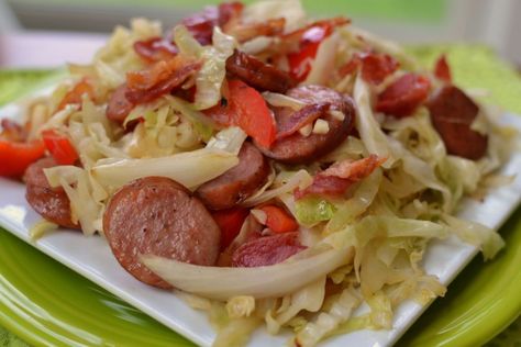 You are just a few minutes away from this delicious low carb Cabbage Bacon Sausage Stir Fry.  This scrumptious recipe keeps things simple with just a handful of ingredients.  Sometimes the simple recipes are the best ones!  Quick to shop and quick to fix Cabbage Bacon Sausage Stir Fry is dependable and delectable every time.  Stir... Read More » Sausage Stir Fry, Sausage And Cabbage, Fried Cabbage With Sausage, Southern Fried Cabbage, Small Town Woman, Cabbage And Sausage, Cabbage Stir Fry, Cabbage And Bacon, Stir Fry Recipe