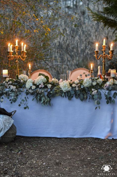 Romantic Outdoor Sweetheart Table - Kelley Nan -Head Table with Candelabras and Lots of Flowers and Eucalyptus Greenery in the forest for a wedding reception, anniversary, or Valentine's Day Wedding Table Settings Diy, Wedding Reception Head Table, Reception Head Table, Wedding Flowers Greenery, Neutral Wedding Flowers, Wedding Arch Rustic, Romantic Wedding Flowers, Head Table Wedding, Head Tables