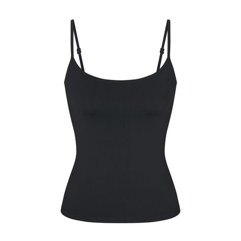 Getting dressed is smoother in SKIMS. Made with our buttery-sleek fabric that smooths and hugs your body, this lightly supportive tank flatters your figure and levels up your off-duty comfort. Features a shelf bra with underbust elastic for light bust support, a scoop neck, and adjustable straps. Hits below the natural waist. Fits true to size. Athletic Clothes Png, Seamless Tank Top, Brandy Melville Png, Black Fitted Top, Wishlist Clothes, Black Tanktop, Tank Tops Lace, Tight Tank Top, Basic Clothes