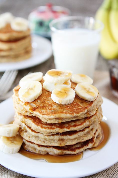 Banana Pancakes Recipe on twopeasandtheirpod.com Light, fluffy pancakes that will remind you of banana bread! They are easy to make and freeze beautifully too! Easy Banana Pancake Recipe, Fluffy Banana Pancakes, Easy Banana Pancakes, Whole Wheat Pancakes, Wheat Pancakes, Banana Pancakes Recipe, Pancake Recipe Easy, What's For Breakfast, Breakfast Pancakes