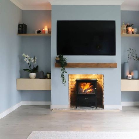 Farwa - Home Decor & DIY on Instagram: "Ad DIY FAUX FIREPLACE 🔥 Shes finished!! Who says newbuilds can't have character 😅 so so in love with this space now, and with our gorgeous @dimplex_uk electric fire. We were on the hunt for an electric fire that looked as realistic as possible and this Dimplex Gosford Optimyst stove definitely looks like a real fire. Love how cosy it is in here now 🥰 Ad PR product - @dimplex_uk Gosford Optimyst electric fire Previous pr products @sassandbelle . . . #chi Electric Stove Media Wall, Dimplex Optimyst Fireplace Ideas, Fire Under Tv, Optimyst Fire, Dimplex Electric Stove, Electric Stove Fireplace, Neutral Lounge, Diy Faux Fireplace, Dimplex Electric Fireplace