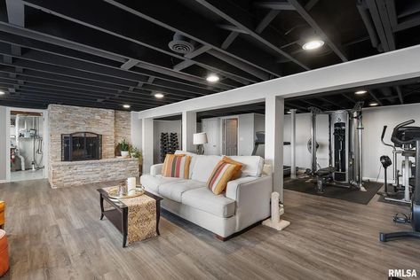 Basement Unfinished Ceiling, Exposed Ceiling Basement, Black Ceiling Basement, Exposed Basement Ceiling Ideas, Finished Basement Gym, Gym Ceiling, Memphis House, Basement Master, Small Finished Basements