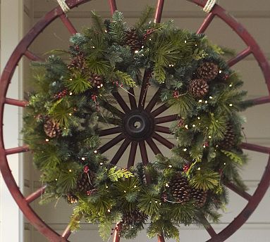 It's only September but I love looking at Christmas decorations! Red Berry Wreath, Wagon Wheels, Wooden Wheel, Cowboy Christmas, 12 December, Western Christmas, Wagon Wheel, Christmas Decorations Rustic, Christmas Decorating Ideas