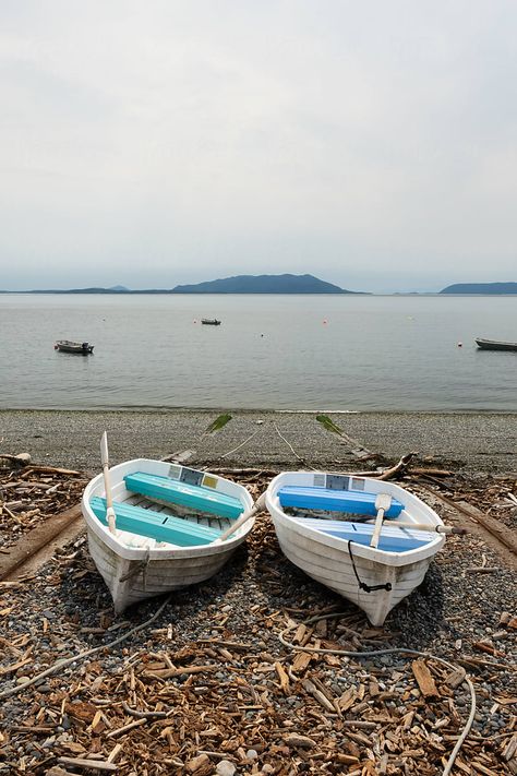 Boats on a beach at Legoe Bay in Lummi Island, Washington, part of Puget Sound and the Salish Sea. Salish Sea, Puget Sound, Seattle Washington, Boats, Washington, Royalty Free Stock Photos, Sound, Stock Photos