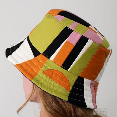 One of a kind bucket hat - pieced together with bright orange, lime green, and dusty pink cotton fabrics accented with black and white cotton linen. Fits most Medium to Large sized heads, unisex, and reversible with a denim interior. - Designed, machine pieced, and sewed by me - Shown fitting a 22.5” head, but can fit heads slightly more or less - Cotton and linen cotton fabrics and denim - Spot clean only! Can be ironed on a low setting to smooth and wrinkles. Linen Fits, Patchwork Bucket Hat, Green Bucket Hat, Quilt Hangers, Hanger Clips, Head Pieces, Lint Roller, Wall Quilts, Cute Hats