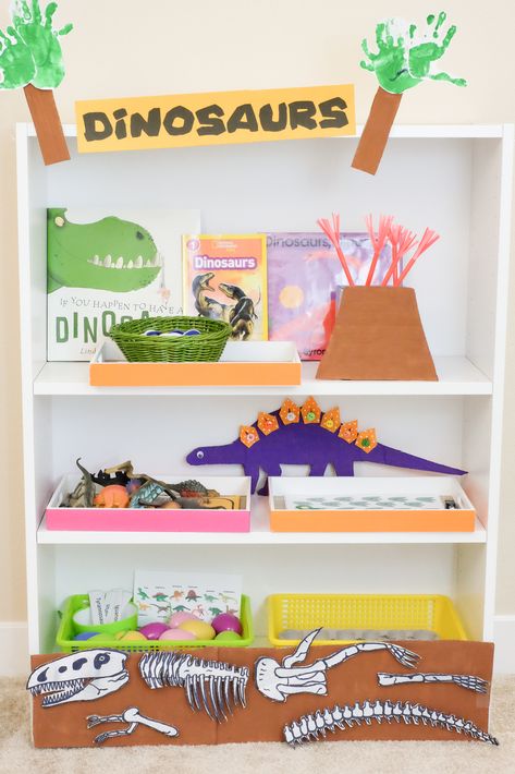 We had so much fun learning at home with our Dinosaur Learning Shelf. Here’s a summary post of all the activities we have done for this theme. To learn about how we do home learning at home with our shelf, I encourage you to read our How HTS Works page first. To know why we … Preschool Dinosaur Theme, Learning Shelf, Dinosaur Week, Dinosaur Classroom, Dinosaurs Preschool, Prek Classroom, Dramatic Play Preschool, Toddler Homeschool, Toddler Classroom