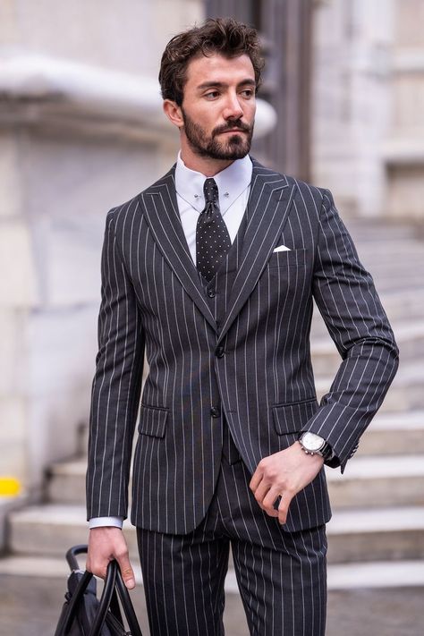 Elevate your formal attire with VIOSSI's Black Striped Slim-Fit Suit 3-Piece. Tailored impeccably, featuring a single-breasted blazer, vest, and pants with 2-button design and peak lapels, this ensemble speaks volumes of refined style. #stripedsuit #blacksuit #tailoredsuits #sophisticatedlook #VIOSSI #mensfashion #sartorialstyle #peaklapels #professionalensemble #mensstyle Suit Styles, Double Breasted Tuxedo, Suit Stores, Vest And Pants, Slim Fit Suit Men, Slim Fit Tuxedo, Navy And Khaki, Slim Fit Suits, Slim Fit Suit