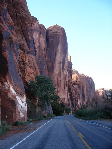 Potash Rd, Moab, UT. Wall Street - stretch of vertical Wingate sandstone cliffs beside the Colorado River, popular for rock climbing. Road Highway, Moab Utah, Colorado River, Rock Climbing, Wall Street, Climbing, Utah, Road Trip, Arizona