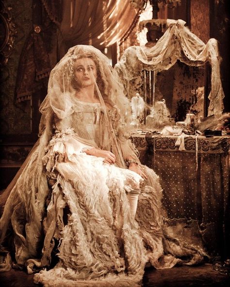 No list of movie wedding dresses would be complete without Miss Havisham (Helena Bonham Carter)'s theatrical gown in 2012's Great Expectations, for which costumer Beatrix Aruna Pasztor looked both to history and modern runway for inspiration. "I was very much influenced by Alexander McQueen's SS13 oyster dress. It's simple but beautiful and a wonderful example of how material can be used and layered to create a dramatic silhouette," Pasztor told Stylist. "What I wanted to create was a f... Movie Wedding Dresses, S Wedding Dress, Marla Singer, Miss Havisham, Crystal Wedding Dress, Wedding Movies, The Lone Ranger, Helena Bonham, Bonham Carter