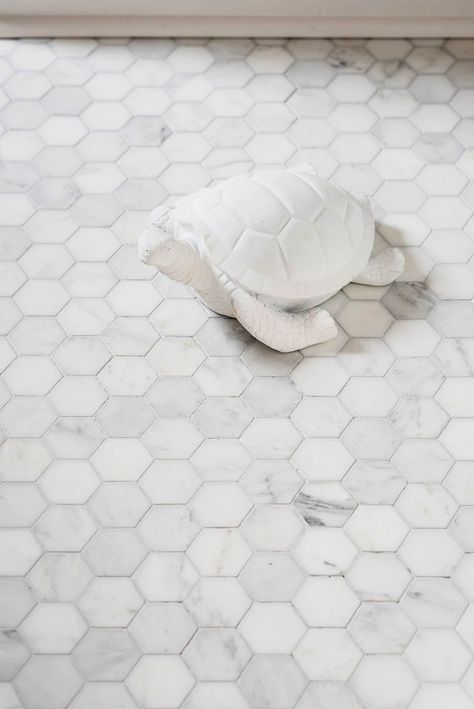 Before and After: An Affordable Black-and-White Bathroom via @mydomaine - MS International Carrara White Hexagon Tile ($16/sq. ft.) White Hexagon Tiles, All White Bathroom, Black White Bathrooms, Bathroom Chic, Hexagon Mosaic Tile, Hexagon Tile, Master Bath Remodel, Hexagonal Mosaic, Bathroom Redo