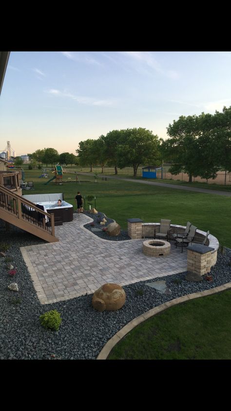 Patio Next To Fence, Backyard Deck With Fire Pit, Two Level Patio Ideas, Walkout Patio Ideas, Deck Off Side Of House, Paver Patio Ideas With Hot Tub, Patio Off Deck With Fire Pit, Paver Patio With Fire Pit, Patio Under Deck With Fire Pit