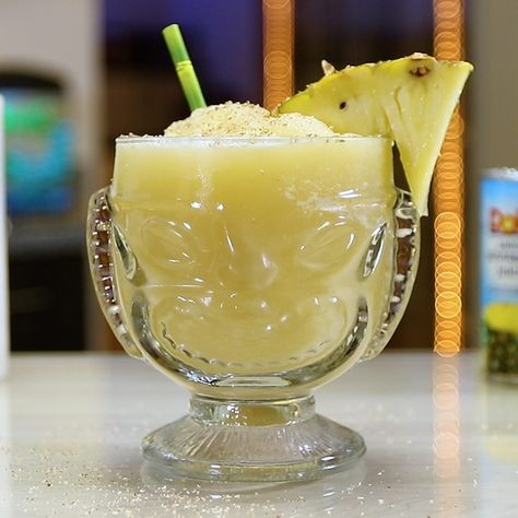 Frozen Painkiller - Tipsy Bartender Painkiller Drink Recipe, Frozen Alcoholic Drinks Recipes, Painkiller Drink, Painkiller Recipe, Malibu Cocktails, Painkiller Cocktail, Fruit Slush, Coconut Ice, Tipsy Bartender