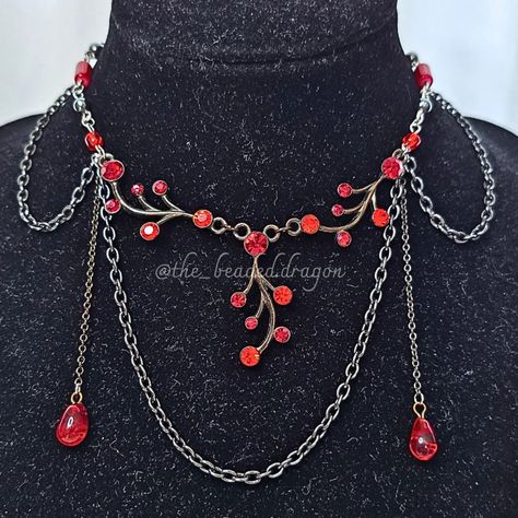 Persephone's Necklace ❤️ €45 set with matching earrings Link to buy: https://thebeadeddragonsshop.etsy.com/listing/1801870191 I can see Persephone wearing this at a ball in the underworld, with a beautiful black and red dress... #persephone #hadesandpersephone #mythology #fantasy #pretty #necklace #handmade #jewelry #upcycled #fairy #whimsical #magical #darkfantasy #romance #ancient #instagram #explore Persephone Earrings, Medieval Jewelry Necklaces Red, Fairy Whimsical, Persephone Necklace, Black And Red Dress, Red Gothic Chain Necklace, Gothic Ruby Necklace, Pretty Necklace, The Underworld