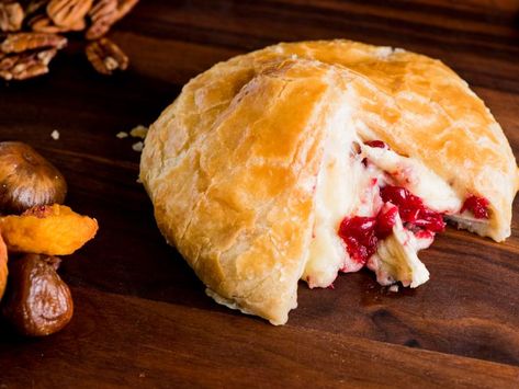 Baked Brie with Cranberry Chutney Recipe | James Briscione | Food Network Baked Brie With Cranberry, Thanksgiving Potluck Recipes, Cranberry Chutney Recipe, Thanksgiving Potluck, Cinnamon Crunch, Homemade Banana Bread, Hanukkah Food, Cranberry Chutney, Baked Brie