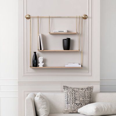 This 3-piece shelf has a clean-lined design that reminds us of vintage-inspired swing seats for a modern look in your home. Each shelf is made from solid mango wood of varying lengths, and they all hang at both ends by a V-shaped, powder-coated iron bar. They're suspended from a horizontal metal pipe that attaches to two circular backplates. Place books, photos, and succulents on these shelves and bring an industrial vibe into your dining room, kitchen, or home office. All wall-mounting hardware Soft Industrial, Accent Shelf, Tiered Shelf, Salon Suites, Decorating Shelves, Boho Chic Furniture, Solid Mango Wood, Boho Chic Decor, Wood Home Decor