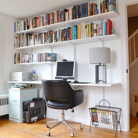 To maximize storage in our home office, I built a hanging shelving and desk unit that holds plenty of books, office supplies, and computer equipment. How To Build A Desk, Track Shelving, Office Design Diy, Hanging Desk, Desk Units, Cheap Office Furniture, Office Shelving, Office Organization At Work, Diy Hanging Shelves