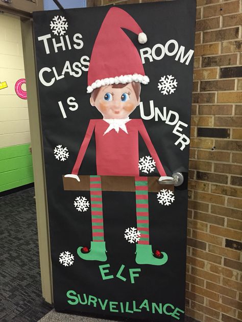 1st grade classroom door- The teacher won an elf on the shelf, so we decorated the door to help her surprise the kids!! Holiday Classroom Doors, Elf Classroom, Winter Classroom Door, Diy Christmas Door Decorations, Door Decorations Classroom Christmas, Christmas Doors, Classroom Christmas Decorations, Holiday Door Decorations, Christmas Workshop