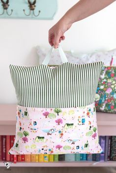 Learn how to make reading pillows with this easy and free reading pillow sewing pattern. They are great things to make for kids as gifts and fun as teacher gifts to! #readingpillow #polkadotchair #sewing Book Carrier, Pillow Case Sewing, Diy Pillow Case, Teaching Kids To Sew, Reading Cushion, Book Pillows, Pillow Covers Tutorial, Making Pillows, Many Pillows