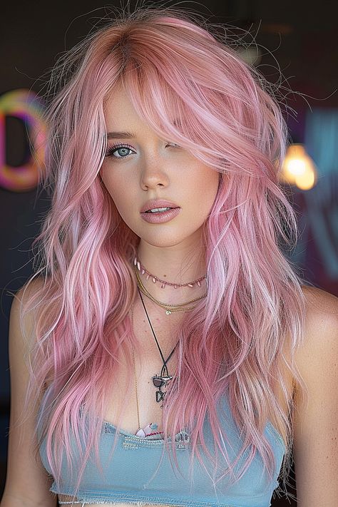 A woman with a pastel pink long shag haircut featuring airy, feather-light layers. Pink Shag Hair, Pink Layered Hair, Long Choppy Haircuts, Shag Hairstyle, Long Shag Hairstyles, Cotton Candy Skies, Long Shag, Long Shag Haircut, Choppy Haircuts