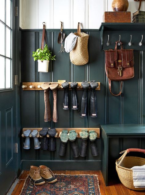 In this mudroom, a combination of deep hunter green and bright white creates a modern two-tone look. #accentwallideas #wallpanelingideas #accentwall #bhg Mudroom Laundry Room, Mudroom Design, Green Walls, Boot Room, Style At Home, Home Fashion, Home Staging, 인테리어 디자인, House Inspiration