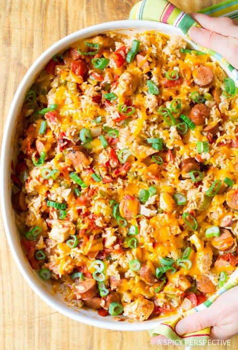 Easy Cheesy Cajun Chicken and Rice Casserole Recipe #jambalaya Recipes With Sausage And Peppers, Cajun Chicken And Rice, Sausage Rice, Cajun Sausage, Rotisserie Chicken Breast, Chicken And Rice Casserole, Chicken Rice Casserole, Rice Casserole Recipes, Jambalaya Recipe