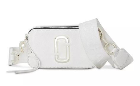 100% authentic MARC JACOBS The Snapshot White silver New with Tags Retail $325 Small camera-style bag in Saffiano leather with an adjustable crossbody strap. DTM (dyed-to-match) Double-J hardware Two zip sections Interior and exterior slip pockets Removable and adjustable webbing strap 7in L x 2in D x 4in H 18cm L x 6cm D x 11cm H Strap 8-57in L x 2in D (21-144 cm L x 5cm D) Strap Drop 27in (68cm)  |  Tradesy is the leading used luxury fashion resale marketplace | 100% AUTHENTIC, OR YOUR MONEY B Marc Jacobs Snapshot Bag, Mini Duffle Bag, Trendy Purses, Handbag Essentials, Bag Women Fashion, Sack Bag, Small Tote Bag, Girly Accessories, Marc Jacobs Bag