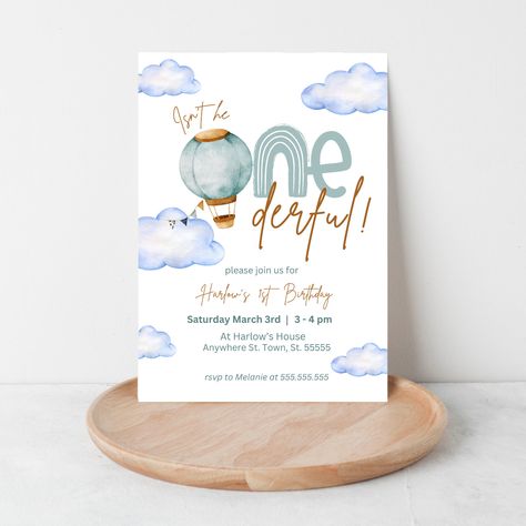 "ISN'T HE ONDERFUL COLLECTION Customize this minimal Isn't He Onderful Hot Air Balloon Boys First Birthday with your own details. Access your invitation within minutes of purchase and begin to add your personal details using CANVA. Wording, font, and font color can all be edited, you can also add photos or a background color easily to match your event style. CANVA is a graphic design platform available to anyone online. It features an intuitive drag-and-drop interface that makes editing easy and fast. You can access your templates on any device (Phone, Computer, or Tablet). --------------------------- YOU WILL RECEIVE --------------------------- * Flat Card Template - (5\"W x 7\"H) ---------------------------------------- WHAT CAN BE CUSTOMIZED ---------------------------------------- All Hot Air Balloon First Birthday, Balloon Birthday Themes, Hot Air Balloon Invitation, Personalized Frames, Boys First Birthday, First Birthday Invite, Balloon Birthday, Personalised Frames, Boy First Birthday