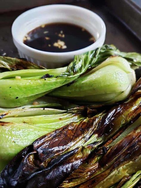 Grilled marinated bok choy is a simple side dish that is quick and easy to make and requires only a few ingredients. Simply whisk together the marinade ingredients, marinade the baby bok choy for 15 minutes, and grill for 5 to 7 minutes. #HalfYourPlate #BokChoy #GrilledBokChoy #SideDish #Vegetarian VegetarianSide Kale Apple Salad, Prime Rib Roast, Jolly Phonics, Baked Pork, Bbq Pulled Pork, Potato Skins, Baked Chicken Breast, Phonics Worksheets, Family Favorite Meals