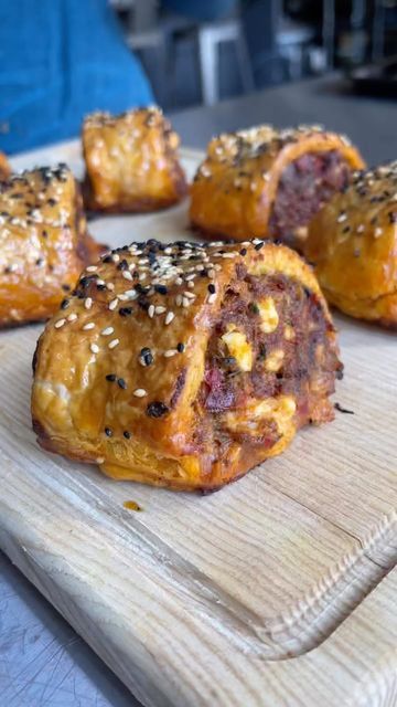 Mob on Instagram: "I really really really love sausage rolls. I developed these ones last year, and I think they may be the nicest ones I’ve developed. Lightly spiced, and studded with little bits of crumbled up feta. A really iconic festive nibble. Recipe on the Mob website, link in bio. Tune is Orchestra Baobab - Coumba. Love, @sophiewyburd x #Mob" Pork Puff Pastry, Harissa Lamb, Lamb Sausage, Sausage Rolls Recipe, Smoked Turkey Recipes, Caramelised Apples, Sausage Roll, Visual Recipes, Sausage Rolls