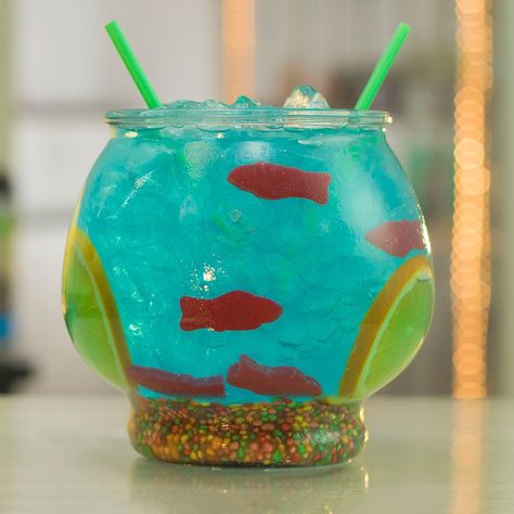 Fish Bowl Drink, Fishbowl Cocktail, Tipsy Bartender Recipes, Fishbowl Drink, Jungle Juice Recipe, Bartender Recipes, Strawberry Sangria, Bartender Drinks, Candy Cocktails