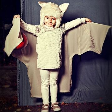 <p>Aria Bevacqua, age 4</p> <p>"Rather than be a typical bat, Aria wanted to be a sweet one like the fruit bat from Stellaluna, by Janell Cannon. By the end of the night, she was calling herself the 'candy' bat!" </p> <p>-- <i>Mom</i>, Amy Bevacqua</p> Bat Girl Costume, Backyard Halloween Party, Halloween Costumes Kids Homemade, Halloween Block Party, Spooky Ideas, Bat Girl, Bat Costume, Batgirl Costume, Creepy Costumes