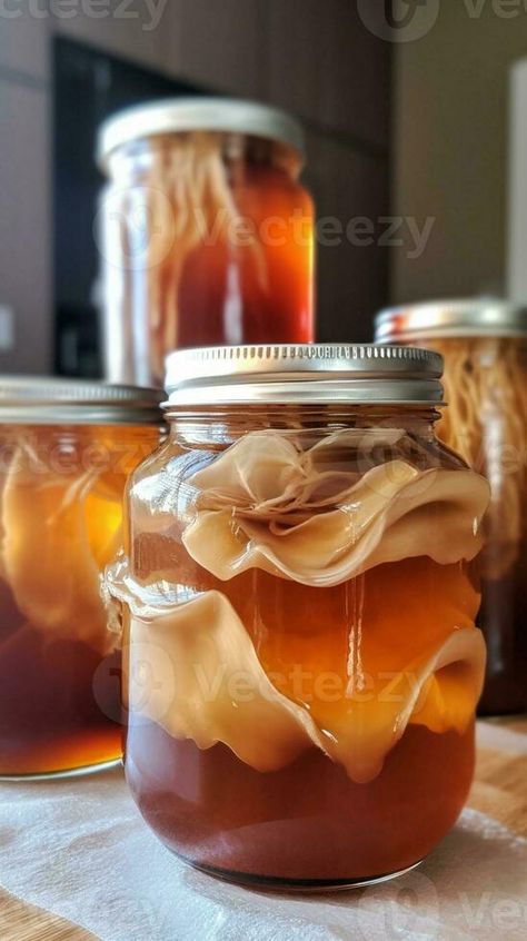 AI Generative homemade fermented drink Jun Tea SCOBY symbiotic culture of bacteria and yeast in a glass jar Jun Tea, Fermented Drink, Vector Drawing, Glass Jar, Yeast, Glass Jars, Tea, Drinks, Photo And Video