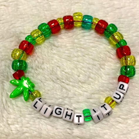 Handmade Word Kandi -This Listing Is For The One Bracelet Pictured Above. Cute Rasta Colors With A Handmade Leaf Charm One Size Fits Most Stretchy Cord Unique And Fun For Your Next Rave Or Festival! Bundling Is Going To Get You The Best Deal So Check Out My Closet For More Kandi Goodies! Edm Edc Raver Pot Stoner Weed 420 Party Kandi Bracelets Jewelry Beads Plur Glitter Outfit Accessories Rainbow Y2k 90s Neon Trippy Rave Candy Bracelets Edm, Candi Ideas Rave, Plur Bracelets Kandi, Ptv Bracelet, Clowncore Jewelry, Jamaica Bracelet, Lil Peep Bracelet, Kandi Bracelet Ideas, Kandi Bracelets Ideas