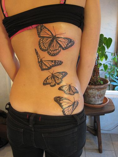 Monarch Butterfly Tattoo by Shannon Archuleta, via Flickr Butterfly Tattoo Cover Up, Butterfly Tattoos Images, Monarch Butterfly Tattoo, Butterfly Name Tattoo, Tattoo Son, Butterfly Tattoo On Shoulder, Butterfly Tattoo Meaning, Butterfly Back Tattoo, Ribcage Tattoo